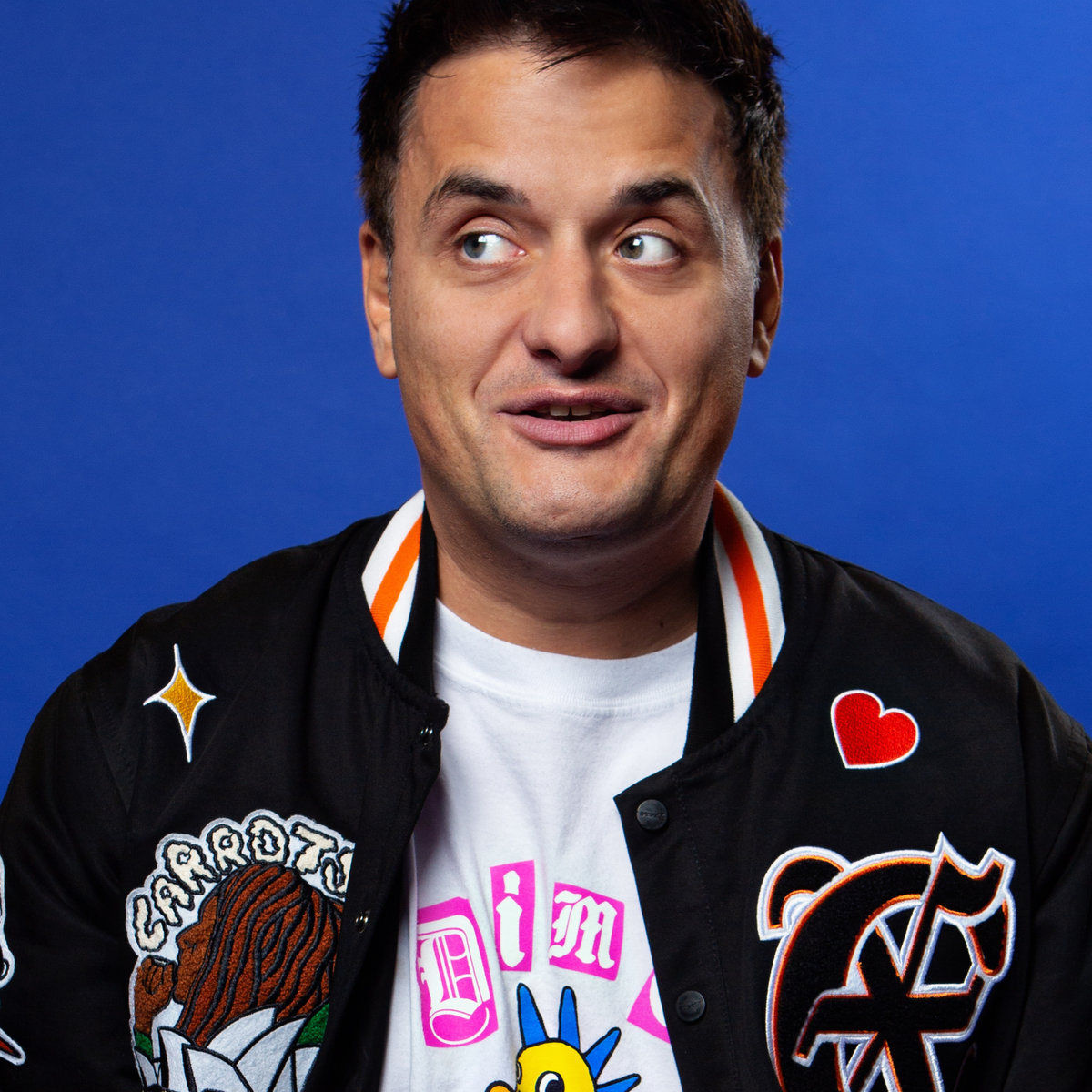 George Zacharopoulos at a comedy club